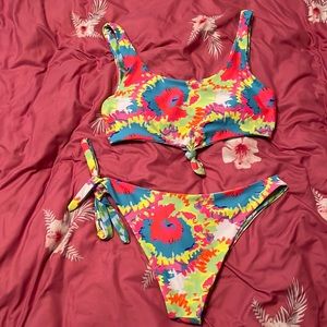 Gorgeous neon colored two piece bathing suit in tune with seasonal styles!